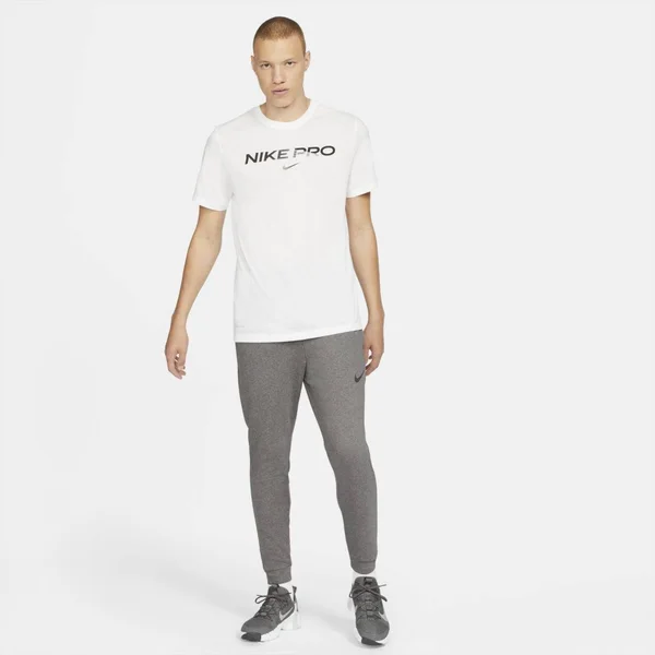 Nike Men's Dri-Fit Tapered Training Pants in Grey/Charcoal Heather Size 4XLT, Cotton/Polyester