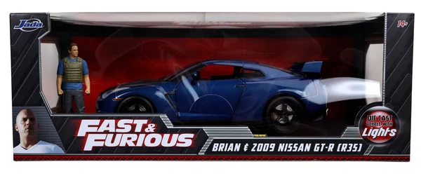 2009 Nissan GT-R (R35) Blue Metallic and Carbon with Lights and Brian Figurine