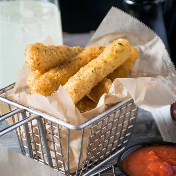 WebstaurantStore 2 lb. Breaded 3x22 Mozzarella Cheese Sticks - 6/Case